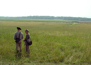Photo of reenactors and Pickett's Chargel - Gettysburg National Battlefield Park