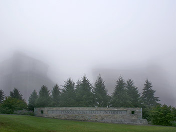 Beaver Stadium in the morning, with fog and sign